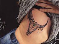 Woman Bull Skull Chest Tattoo