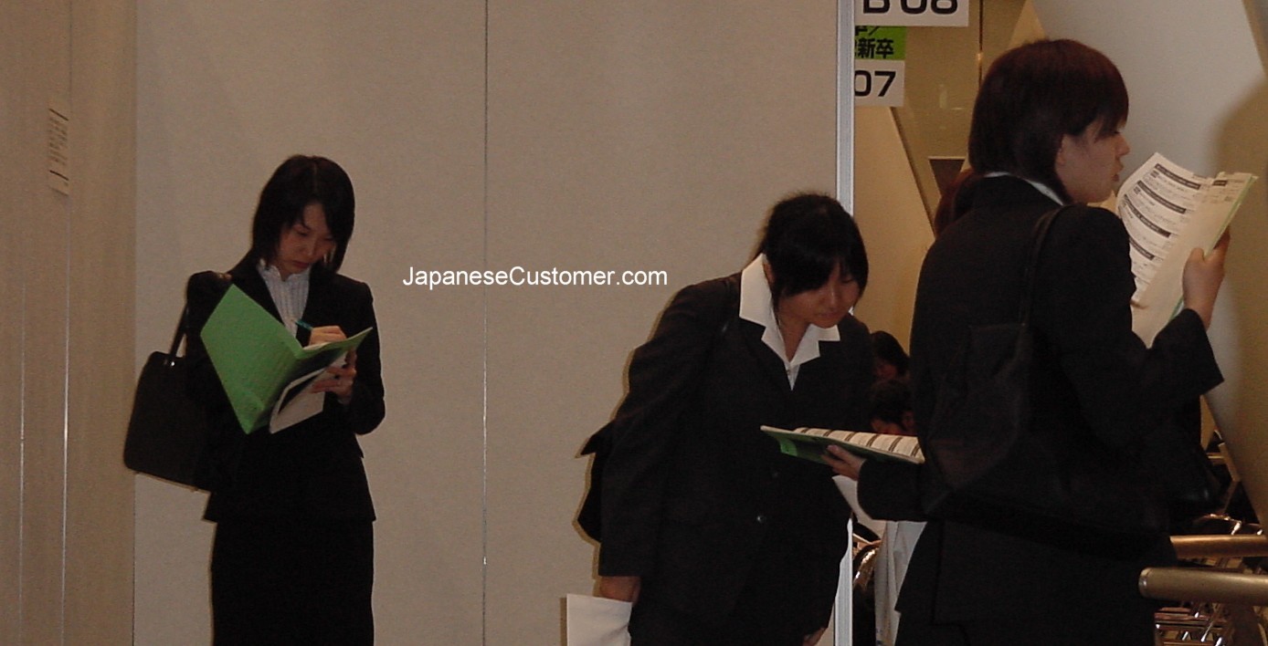 Japanese graduates at recruitment fair Copyright Peter Hanami 2005