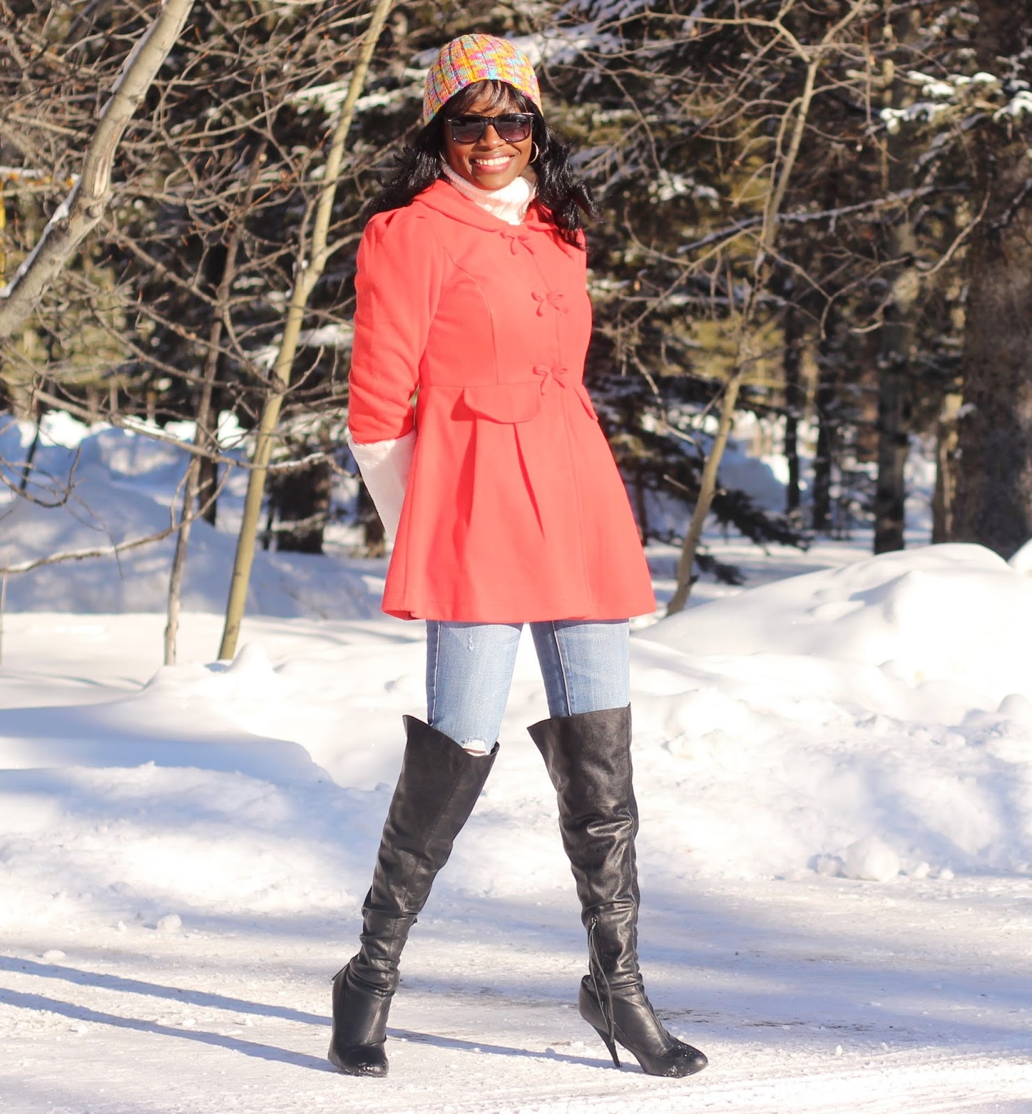 Coat dress styled with over the knee boots