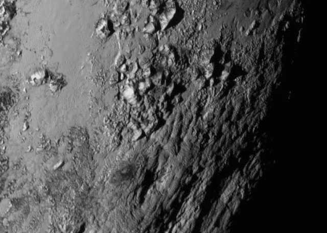 Photograph by New Horizons of a range of youthful mountains on Pluto