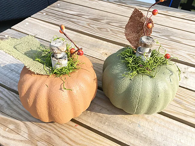 orange and green suede pumpkins with peg stems