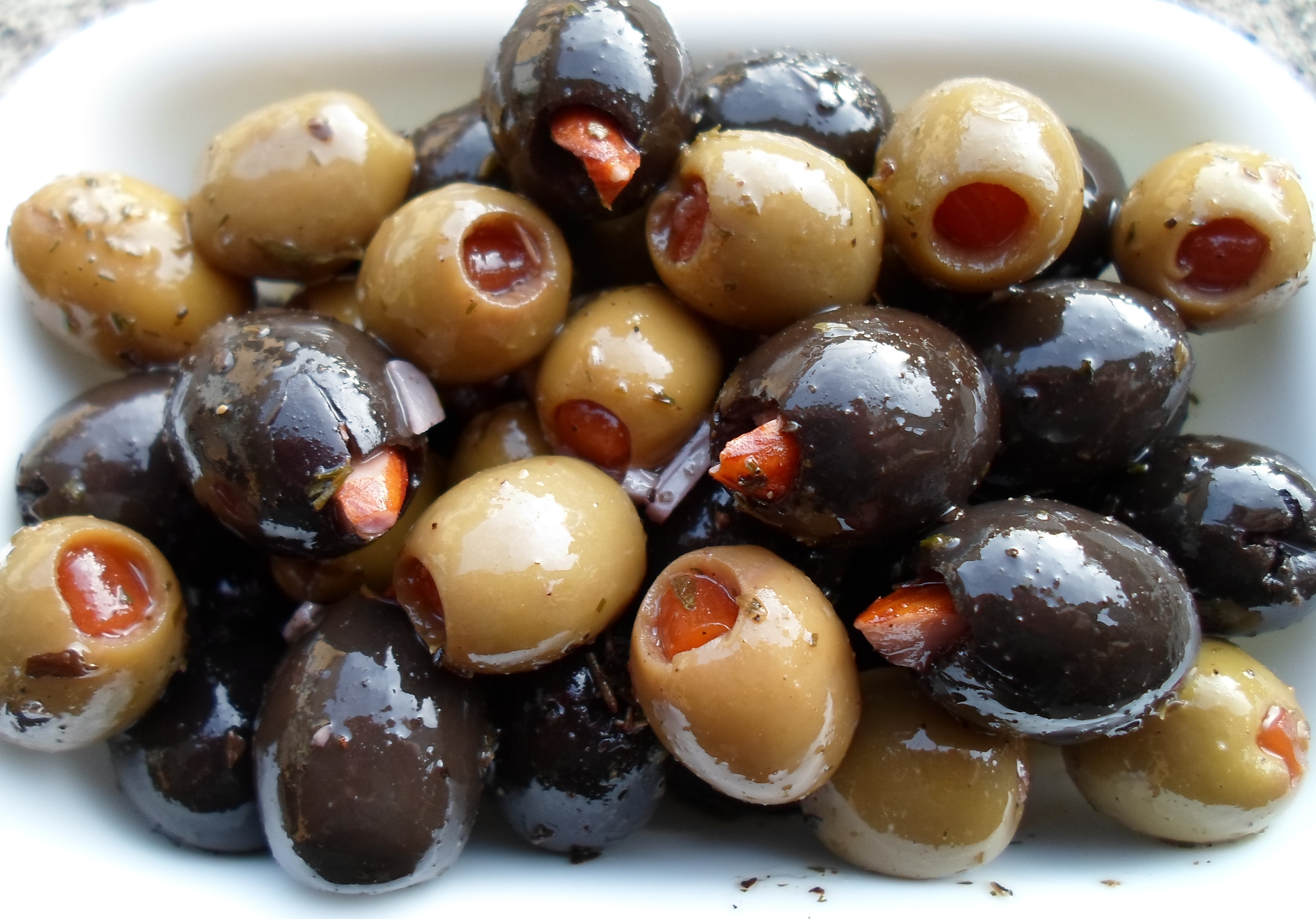 Happier Than A Pig In Mud Marinated Almond Stuffed Olives Appetizer