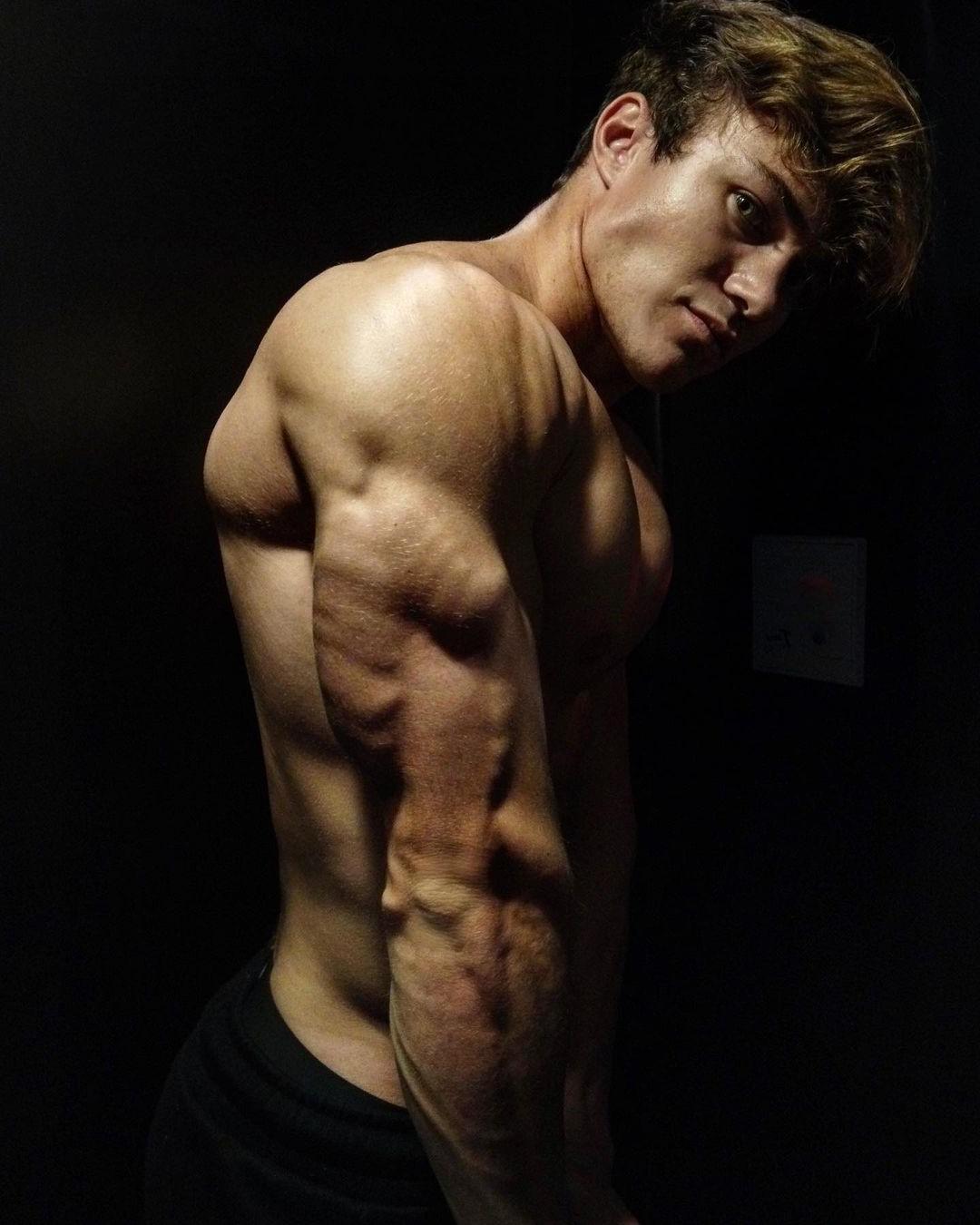 triceps-flex-jason-bjarnson-mysterious-fit-muscular-shirtless-young-hunk-huge-pecs-dude
