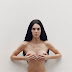 KENDALL JENNER TRANSFORMS INTO MAURIZIO CATTELAN'S ARTWORK FOR 'GARAGE MAGAZINE'