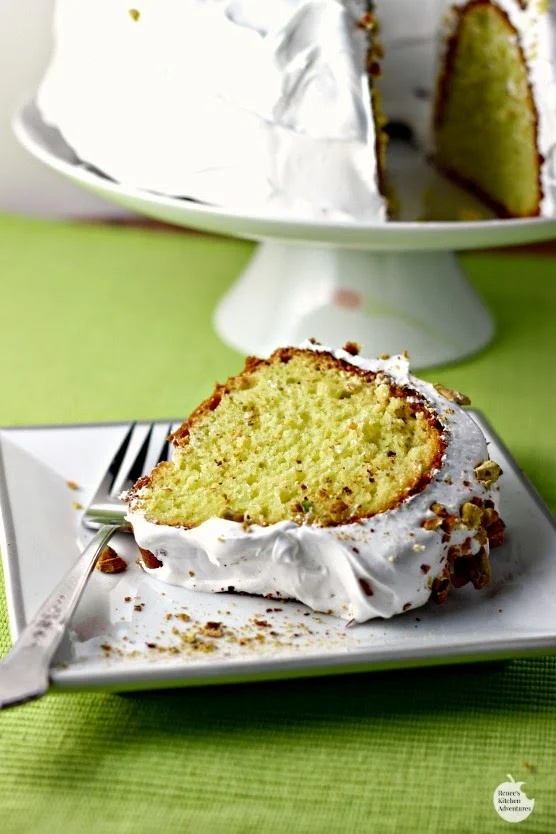 Pistachio Cake with Marshmallow Frosting | Renee's Kitchen Adventures: A pudding cake with lots of flavor and a fun green color! 