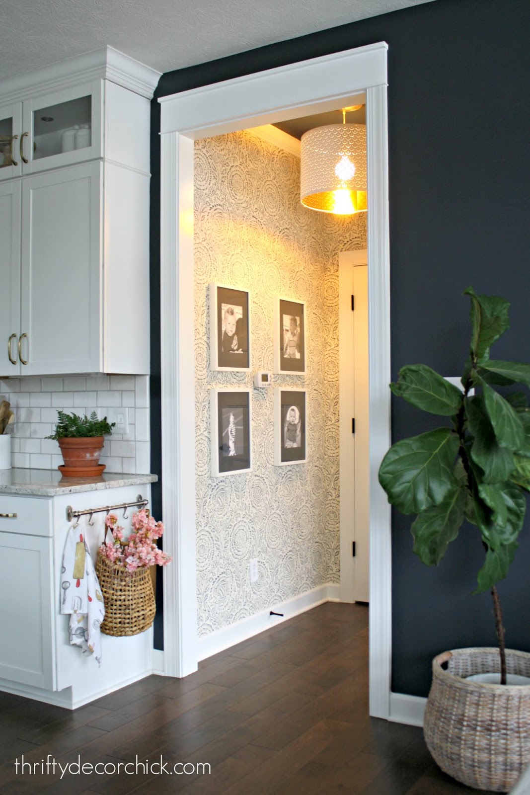 blue and white wallpaper hallway