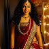 Nithya Menon Hip Show In Red Traditional Saree