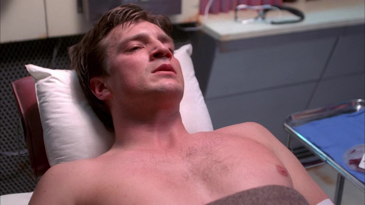 Nathan Fillion shirtless in Firefly 1-08 "Out Of Gas" .