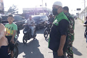 Radio Antar Penduduk Indonesia (RAPI) Aceh Pidie Bagikan Masker ke Pengguna Jalan Raya