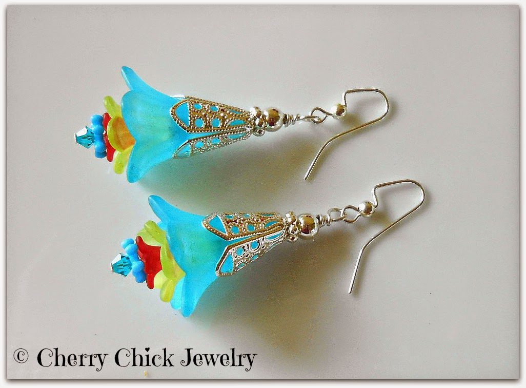 http://www.cherrychickjewelry.com/product/lucite-flower-victorian-earrings-aqua-blue-yellow-red-swarovski-crystals
