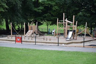 restored play area after a fire by vandals