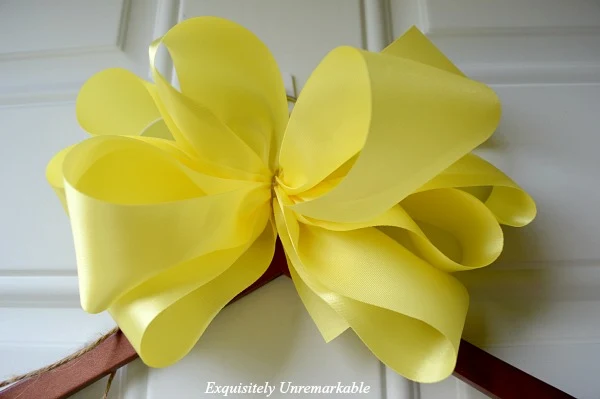 Yellow bow on hanger