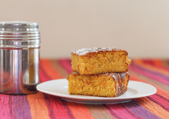 Food Lust People Love: Super easy to make, the rich batter for these almond clementine cake squares is whipped up in a food processor with long simmered clementines, which you don’t even peel. I’ve been making versions of this cake for years with great success. As long as your guests like orange marmalade and almonds, they are going to be huge fans, I promise. This recipe is adapted from Nigella Lawson’s very first book, How to Eat, the Pleasures and Principles of Good Food, originally published in 1998. It is naturally gluten-free as long as you take care that your baking powder is gluten-free, of course.