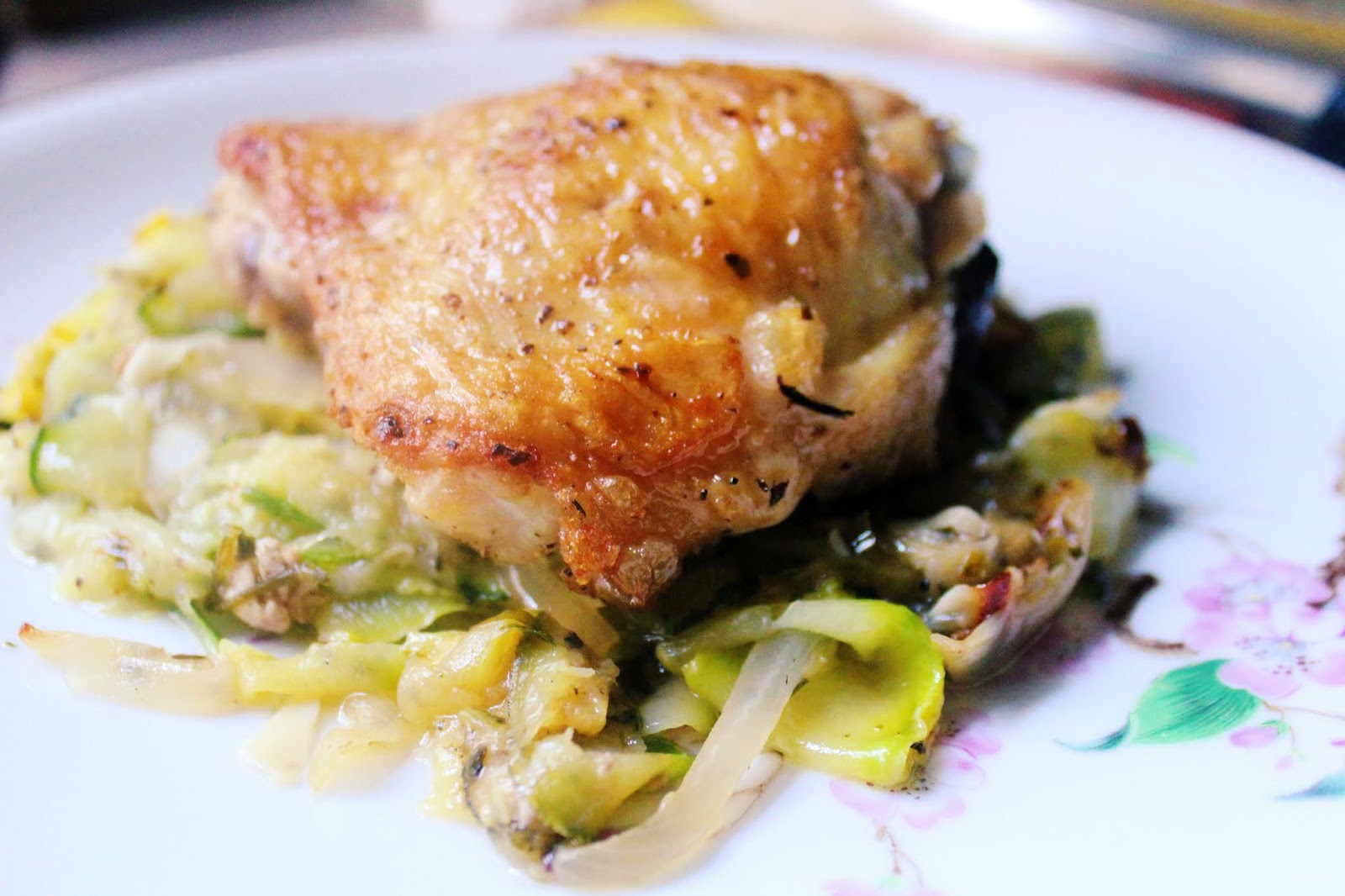 Crispy Chicken Thighs over Melted Zucchini