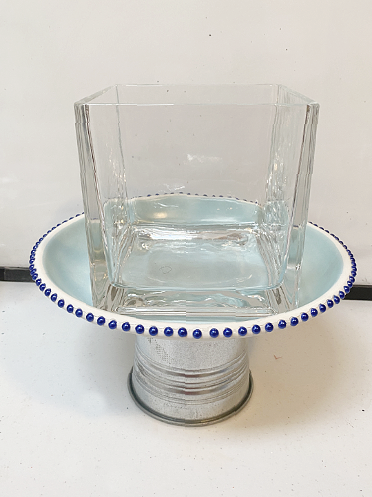 glass dish on top to weight the pedestal dish