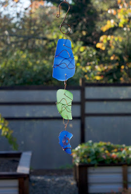 Blue and green glass sun catcher with copper, handcrafted by Coast Chimes