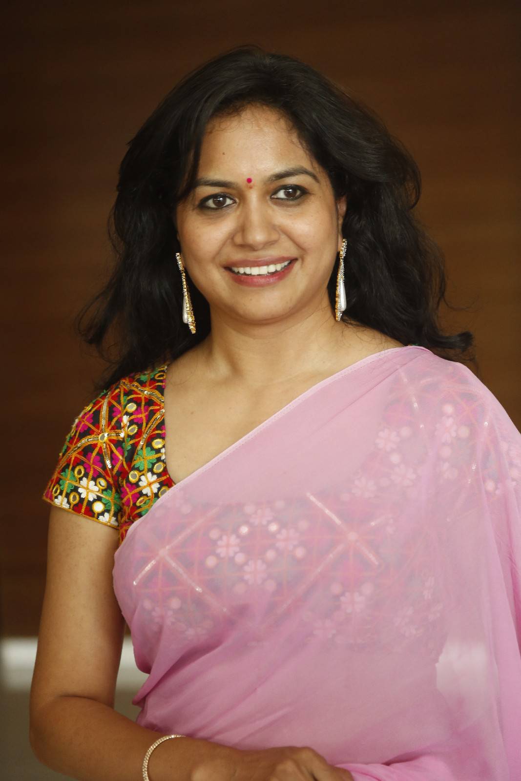 Singer Sunitha Latest Stills In Pink Saree
