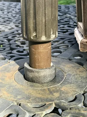 Make the patio table hole fit the umbrella pole