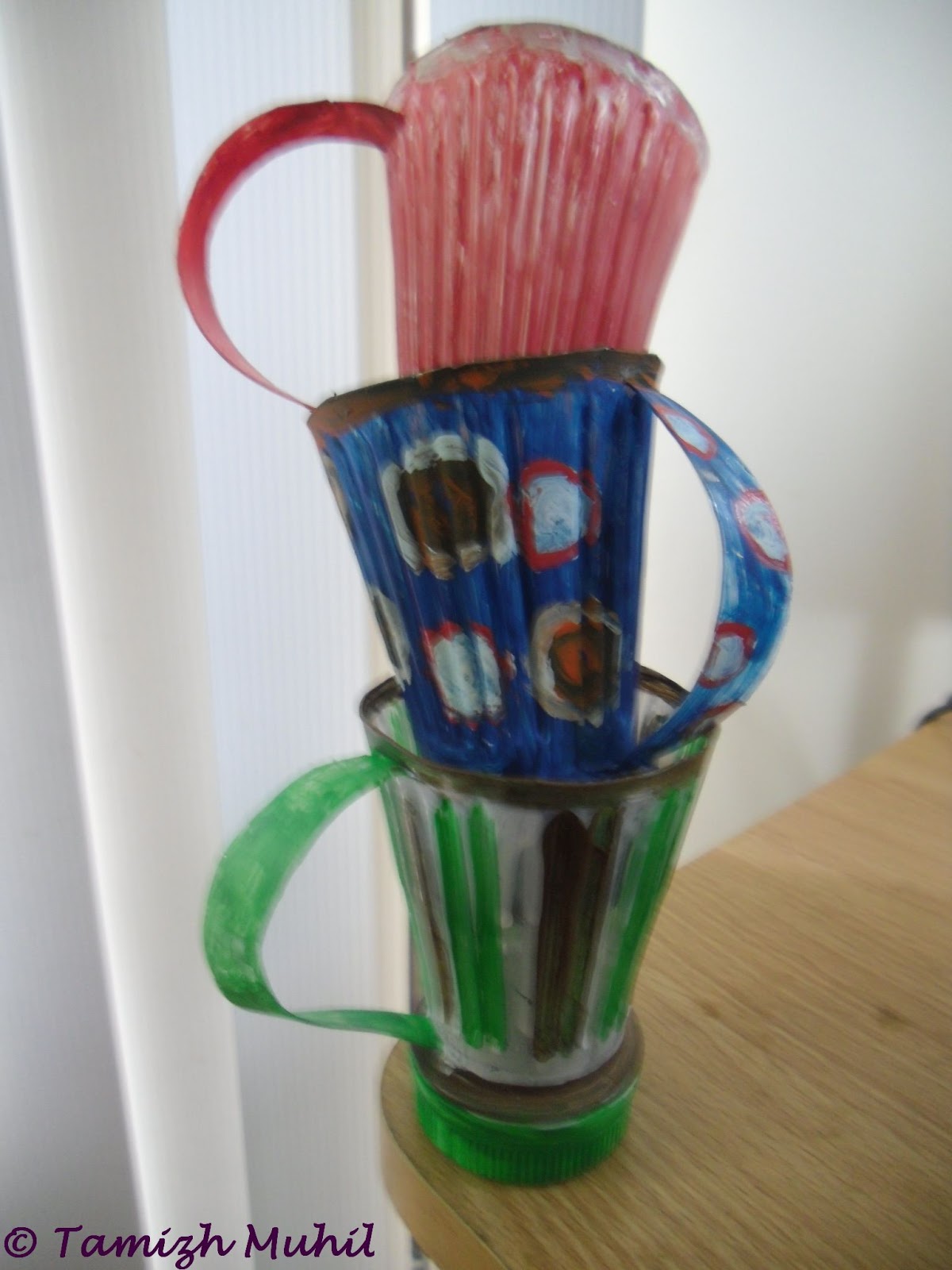 Cups made from empty welch juice bottles.