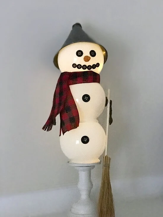 Light up snowman using repurposed parts