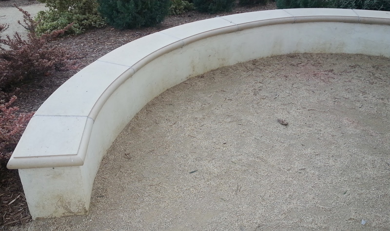 The 2 Minute Gardener Photo Seating Wall with a Stepstone Cap