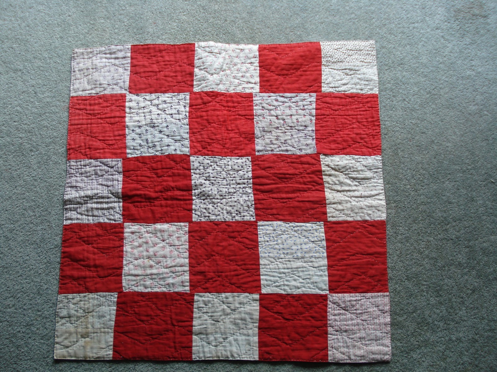 white cot quilt