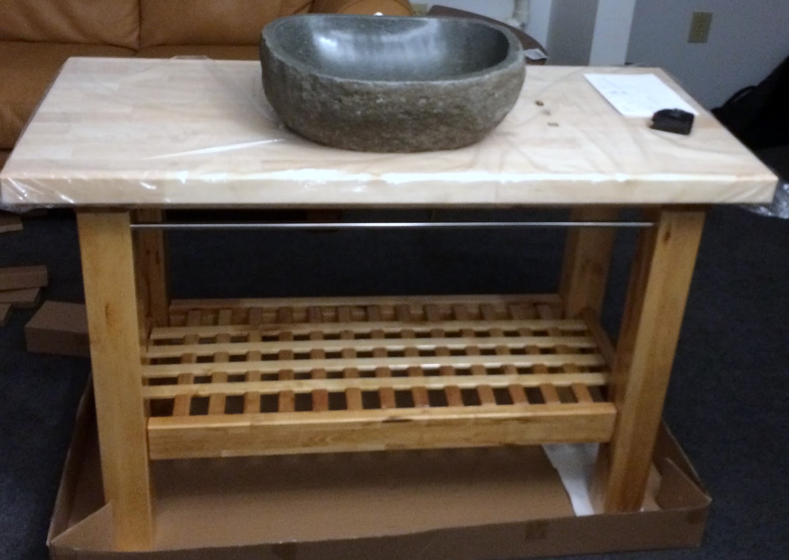 Ikea Groland as a bathroom vanity with a vessel sink