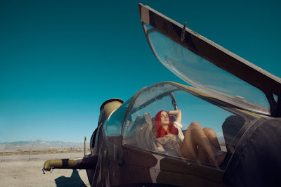 woman inside of plane, vintage tiger shark airplane, fashion photographer los angeles