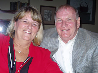 A photo of Tod and Paula Eaton, sitting at a table.