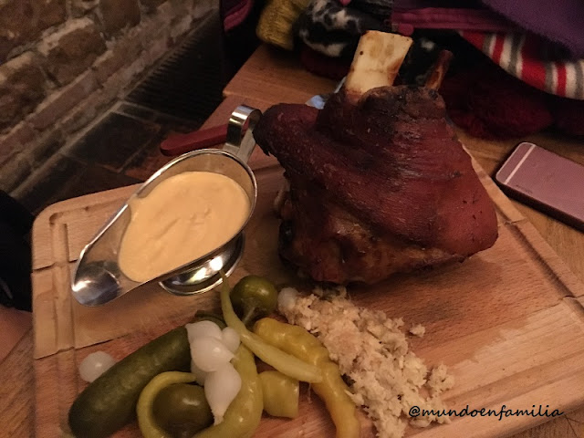 Roasted pork back knee with traditional garnish (Restaurante Krcma)