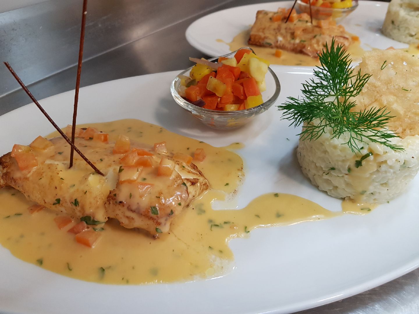 Dos d'aiglefin, sauce homardine et risotto aux herbes