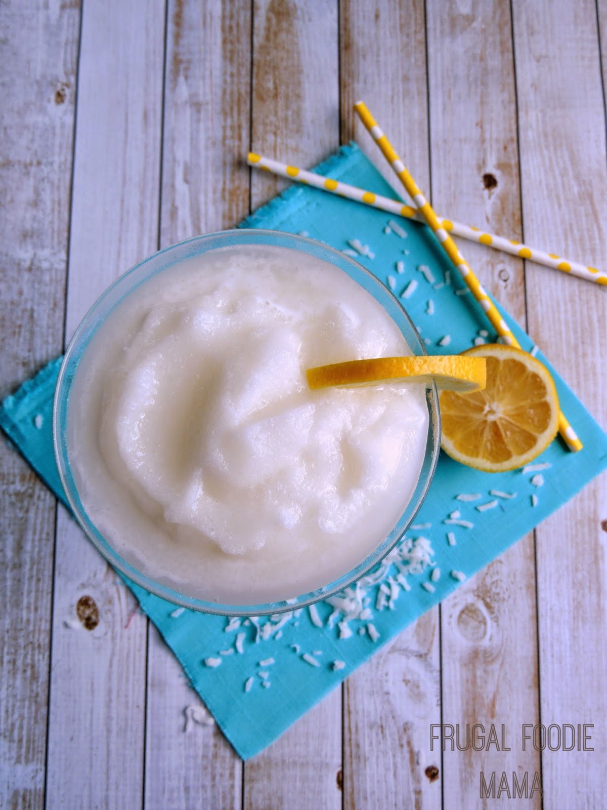 This Frozen Lemonade Colada is what happens when you blend a lemonade stand with the beach- a perfect frosty sip of summer.