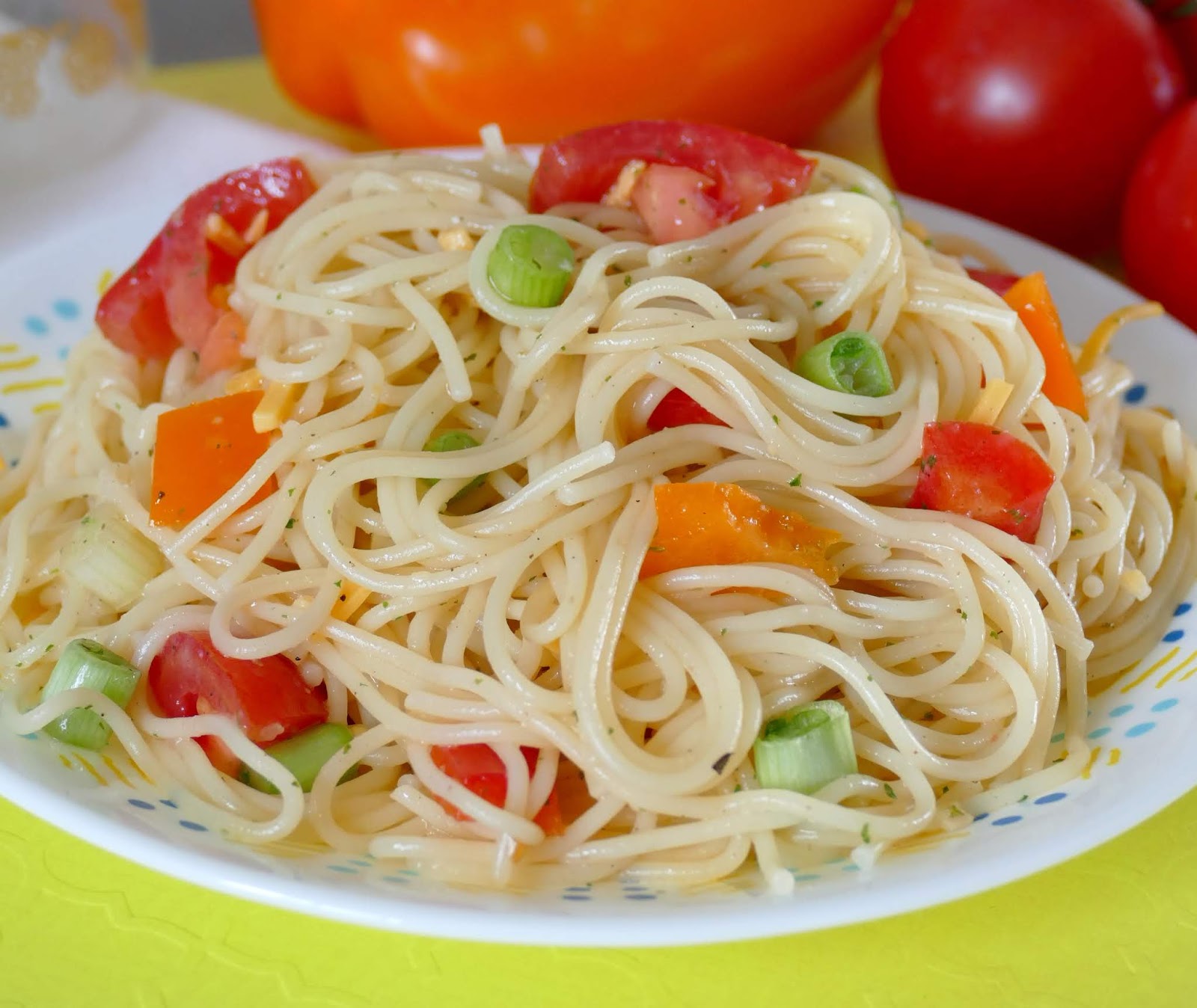 This simple pasta salad is great for any spring or summer BBQ, potluck, meal or picnic! The ranch adds delicious flavor to the pasta, tomatoes, green onions and bell pepper. Plus there's no mayo which makes it versatile and easy to customize!
