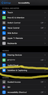 screenshot of iPhone accessibility options in settings with circle around Subtitles and Captioning