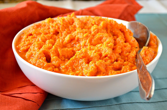 Mashed Yams in a white bowl.