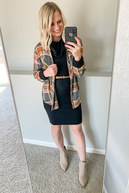 Black sweater dress with plaid flannel shirt