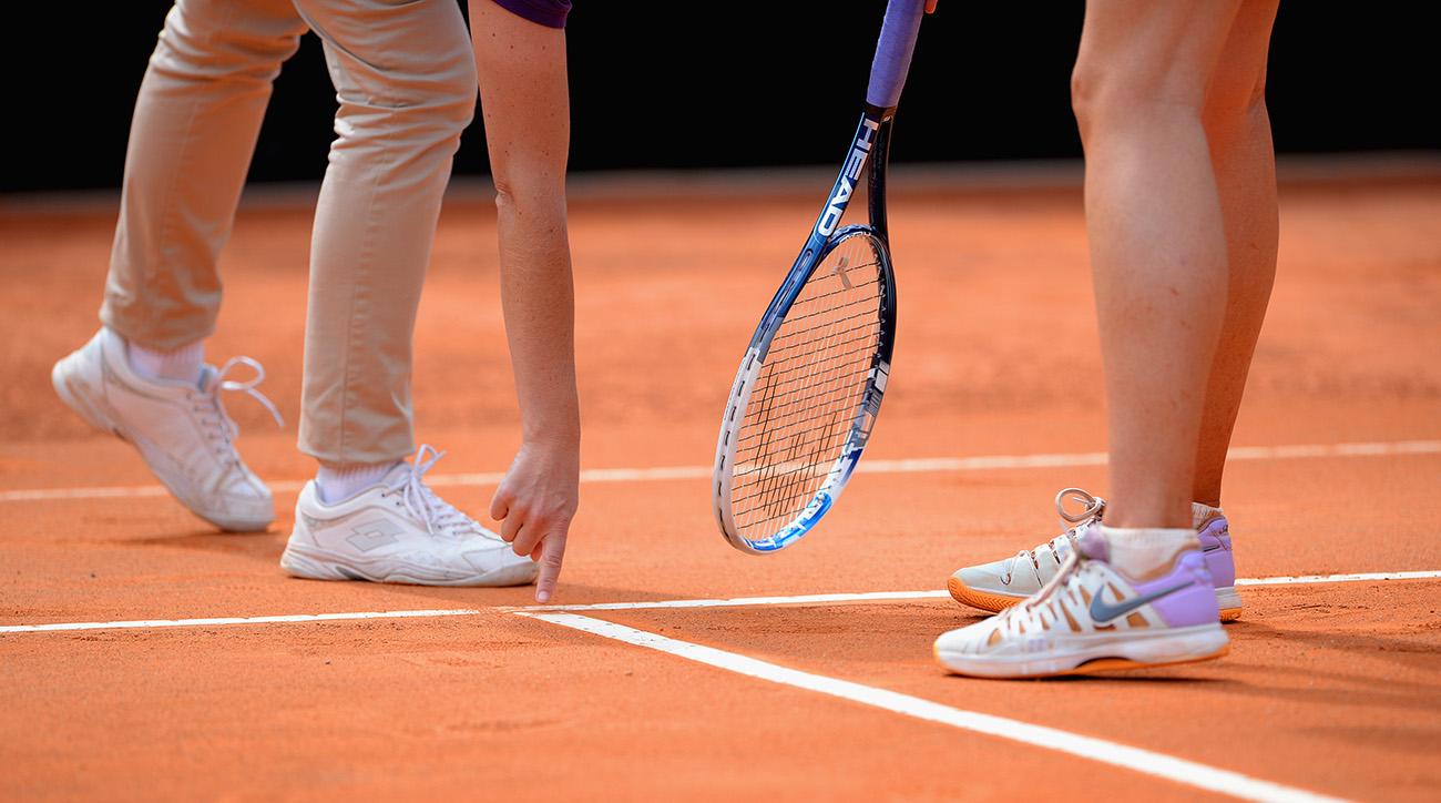 Tennis Officials World: Good Coaching or Cheating? You Decide...