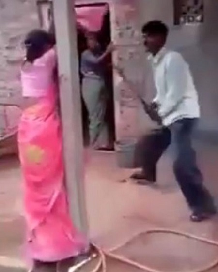 Drama as Man Ties Up His Wife and Her Lover to a Pole and Beats Them