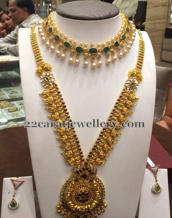 Mango Haar and Emerald Choker Jewellery Designs