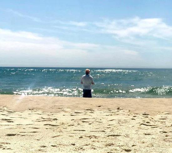 Man fishing on the beach