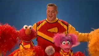 Billy Gardell talks about Cheer with Elmo and Abby. the Word on the Street is Cheer. Sesame Street Episode 4420, Three Cheers for Us, Season 44
