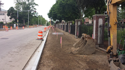 new sidewalks being installed along Main St