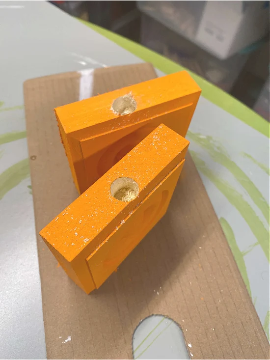 Drilled holes in orange corner moldings