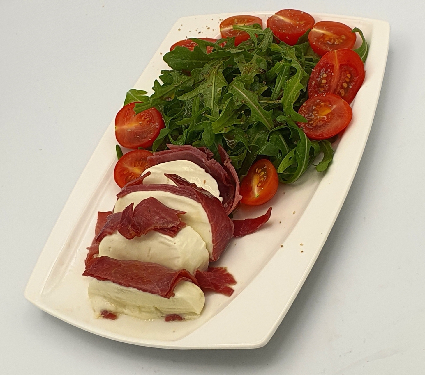 Wessels low carb Welt: Mozzarella in Schinken auf Rucola-Salat