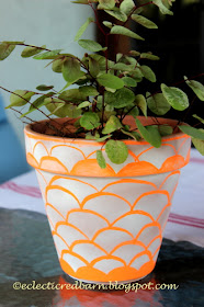 Ceramic pot decorated with chalk markers