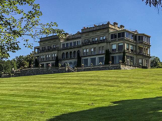 Along the Lake Geneva Lake Shore Path in Lake Geneva Wisconsin Three story stone mansion and portico