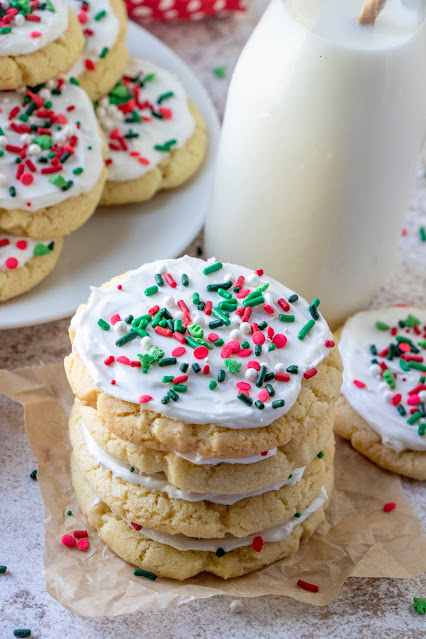 The Best Vanilla Almond Frosted Sugar Cookies holiday with milk