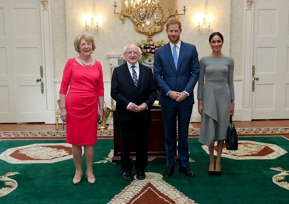 Meghan Markle wore Roland Mouret bespoke Barwick grey dress and Birks Snowflake snowstorm diamond earrings, she carried Fendi Peekaboo bag