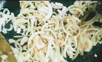 Frying onion for matar paneer gravy