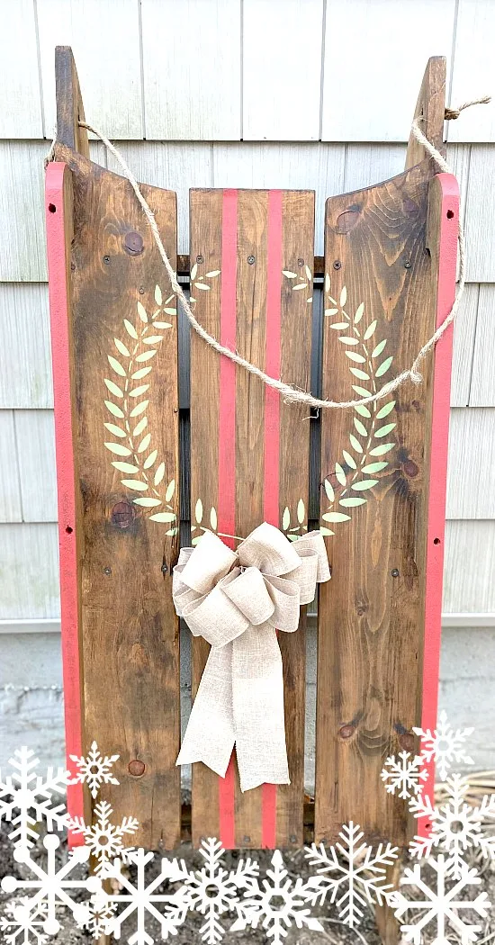 Wooden sled with a wreath
